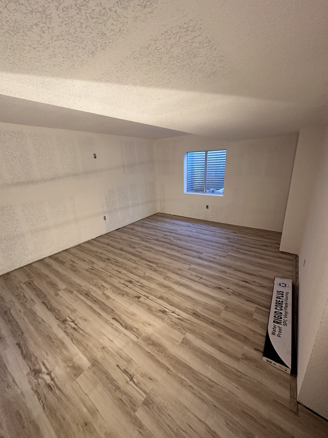 Basement renovation drywall and finishing progress