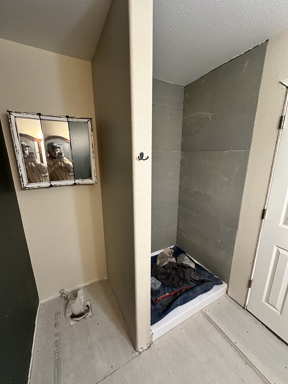 Bathroom shower area before renovation