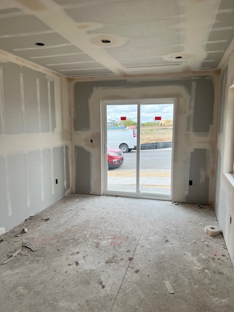 Interior drywall finishing in progress